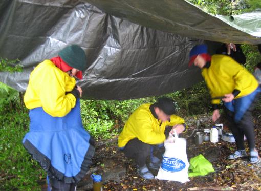 We ate lunch under a tarpaulin in the rain