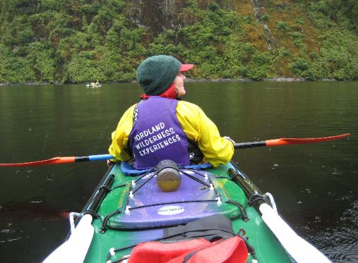 Robin sat in the front seat of our tandem kayak