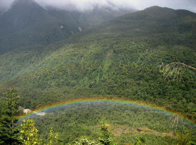 Looking down on a rainbow arcing over Dusky Track (one tramp we're not doing)