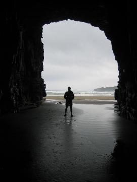 Bob standing in front of the entrance to dramatic Cathedral Caves